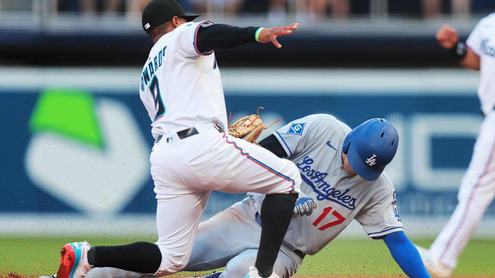 Los Angeles Dodgers designated hitter Shohei Ohtani is tagged out by Miami Marlins shortstop Xavier Edwards.