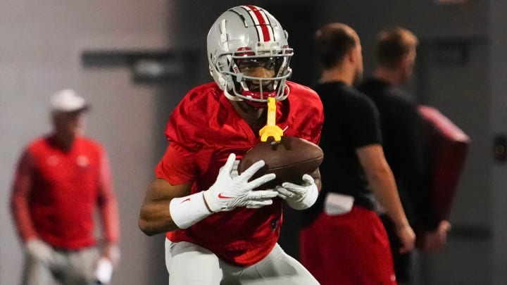 Mar 7, 2024; Columbus, OH, USA; Ohio State Buckeyes wide receiver Carnell Tate (17) returns a punt during spring football practice at the Woody Hayes Athletic Center.