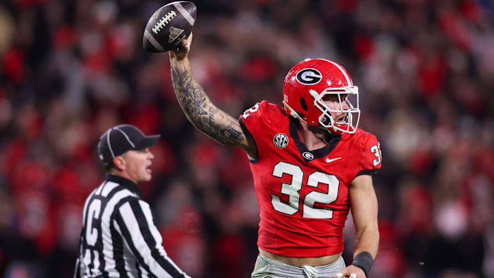Nov 29, 2024; Athens, Georgia, USA; Georgia Bulldogs linebacker Chaz Chambliss (32) reacts after recovering a fumble against the Georgia Tech Yellow Jackets in the fourth quarter at Sanford Stadium. Nov 29, 2024; Athens, Georgia, USA; Georgia Bulldogs linebacker Chaz Chambliss (32) reacts after recovering a fumble against the Georgia Tech Yellow Jackets in the fourth quarter at Sanford Stadium.
