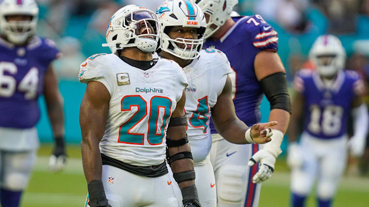Miami Dolphins linebacker Jordyn Brooks (20) and defensive tackle Jordan Phillips (94) celebrate a fourth down stop against the Buffalo Bills during the fourth quarter at Hard Rock Stadium during the 2025 season. Miami Dolphins linebacker Jordyn Brooks (20) and defensive tackle Jordan Phillips (94) celebrate a fourth down stop against the Buffalo Bills during the fourth quarter at Hard Rock Stadium during the 2025 season.