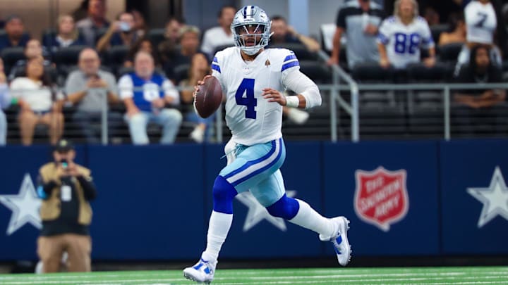 Dallas Cowboys QB Dak Prescott looks to throw a pass at AT&T Stadium. Dallas Cowboys QB Dak Prescott looks to throw a pass at AT&T Stadium.