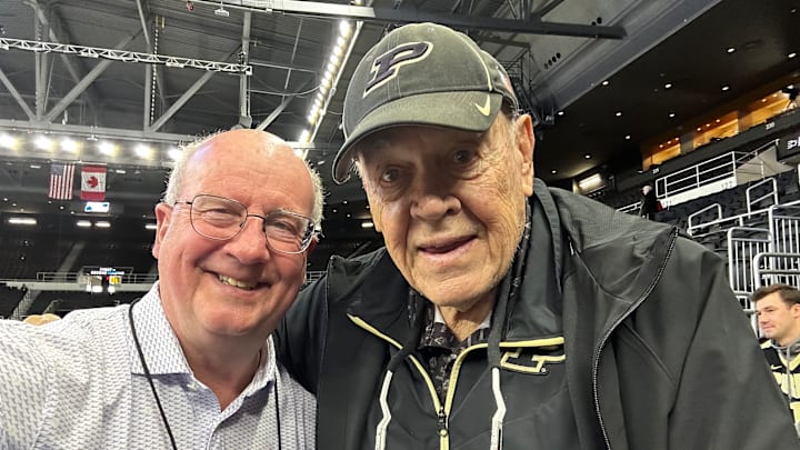 Purdue Boilermakers on SI publisher Tom Brew (left) poses with former Boilers coach Gene Keady during the NCAA Tournament in Providence, R.I. in March 2025.