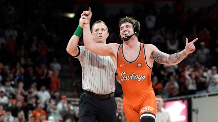 Oklahoma State's Zack Ryder celebrates after defeating Iowa's Gabe Arnold at 184 pounds during a college wrestling dual between the Oklahoma State University Cowboys (OSU) and the Iowa Hawkeyes at Gallagher-Iba Arena in Stillwater, Okla., Sunday, Feb. 22, 2026.
