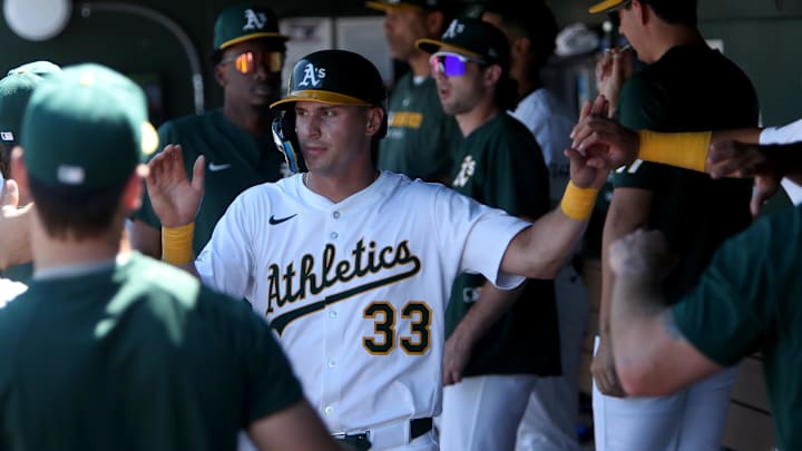 Aug 3, 2025; West Sacramento, California, USA; Athletics left fielder JJ Bleday (33) celebrates with teammates after scoring a run against the Arizona Diamondbacks during the seventh inning at Sutter Health Park. Mandatory Credit: Dennis Lee-Imagn Images