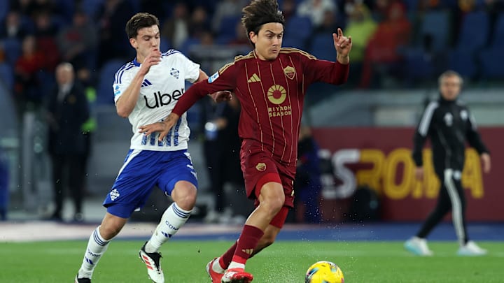 (L-R) Maxime Perrone of Como and Paulo Dybala of Roma seen... (L-R) Maxime Perrone of Como and Paulo Dybala of Roma seen...