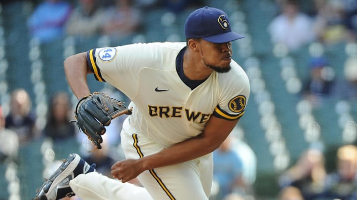 May 13, 2021; Milwaukee, Wisconsin, USA;  Milwaukee Brewers relief pitcher Angel Perdomo (47) delvers a pitch against the St. Louis Cardinals in the ninth inning at American Family Field. Mandatory Credit: Michael McLoone-Imagn Images