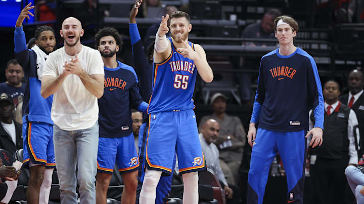 Dec 1, 2024; Houston, Texas, USA; Oklahoma City Thunder center Isaiah Hartenstein (55) celebrates with teammates after a play during the game against the Houston Rockets at Toyota Center. Mandatory Credit: Troy Taormina-Imagn Images