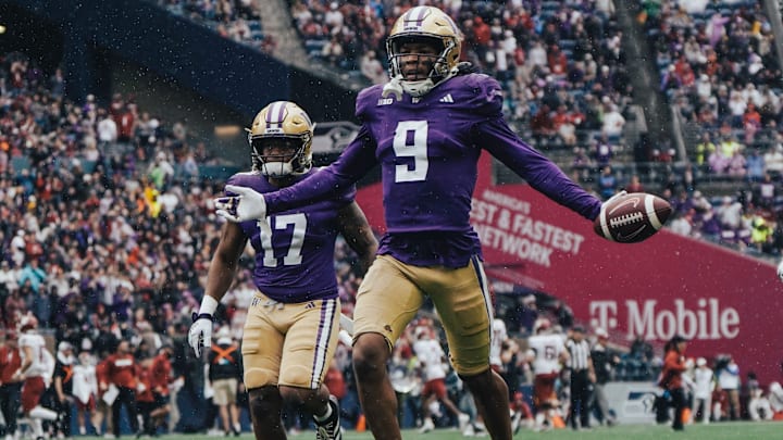 Thaddeus Dixon celebrates an interception against WSU.