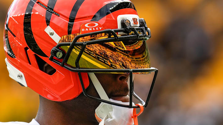 Cincinnati Bengals wide receiver Tee Higgins (5) runs warmups before the first quarter of the NFL Week 11 game between the Pittsburgh Steelers and the Cincinnati Bengals at Acrisure Stadium in Pittsburgh on Sunday, Nov. 16, 2025. Cincinnati Bengals wide receiver Tee Higgins (5) runs warmups before the first quarter of the NFL Week 11 game between the Pittsburgh Steelers and the Cincinnati Bengals at Acrisure Stadium in Pittsburgh on Sunday, Nov. 16, 2025.