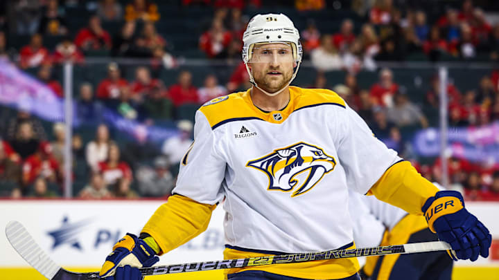 Nov 15, 2024; Calgary, Alberta, CAN; Nashville Predators center Steven Stamkos (91) during the face off against the Calgary Flames during the third period at Scotiabank Saddledome. Mandatory Credit: Sergei Belski-Imagn Images