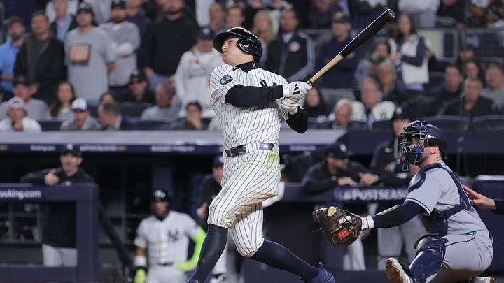 Oct 7, 2026; Bronx, New York, USA; New York Yankees shortstop Anthony Volpe (11) hits a double after fan interference during the sixth inning against the Tampa Bay Rays in game three of the ALDS for the 2026 MLB Playoffs at Yankee Stadium. Mandatory Credit: Brad Penner-Imagn Images Oct 7, 2026; Bronx, New York, USA; New York Yankees shortstop Anthony Volpe (11) hits a double after fan interference during the sixth inning against the Tampa Bay Rays in game three of the ALDS for the 2026 MLB Playoffs at Yankee Stadium. Mandatory Credit: Brad Penner-Imagn Images