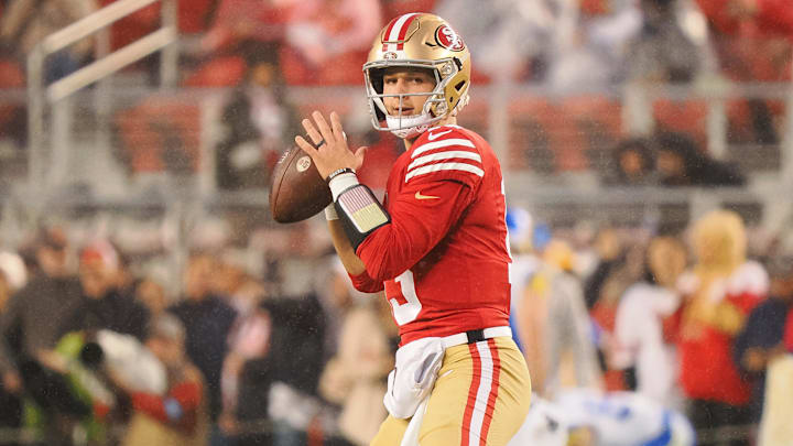 Dec 12, 2024; Santa Clara, California, USA; San Francisco 49ers quarterback Brock Purdy (13) warms up before the game against the Los Angeles Rams at Levi's Stadium. Mandatory Credit: Kelley L Cox-Imagn Images Dec 12, 2024; Santa Clara, California, USA; San Francisco 49ers quarterback Brock Purdy (13) warms up before the game against the Los Angeles Rams at Levi's Stadium. Mandatory Credit: Kelley L Cox-Imagn Images