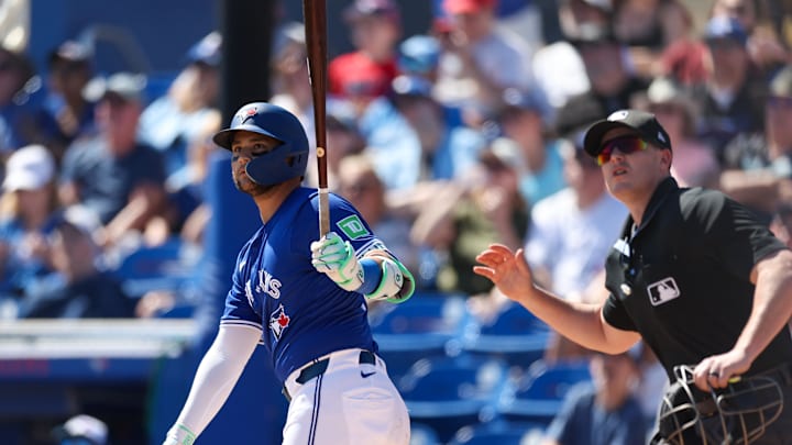 Dunedin, Florida, USA; Toronto Blue Jays shortstop Bo Bichette (11) hits a home run against the Philadelphia Phillies in the third inning during spring training at TD Ballpark. Dunedin, Florida, USA; Toronto Blue Jays shortstop Bo Bichette (11) hits a home run against the Philadelphia Phillies in the third inning during spring training at TD Ballpark.