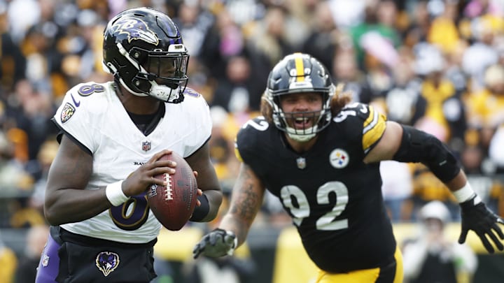 Oct 8, 2023; Pittsburgh, Pennsylvania, USA; Baltimore Ravens quarterback Lamar Jackson (8) scrambles with the ball against the Pittsburgh Steelers during the fourth quarter at Acrisure Stadium. Mandatory Credit: Charles LeClaire-Imagn Images Oct 8, 2023; Pittsburgh, Pennsylvania, USA; Baltimore Ravens quarterback Lamar Jackson (8) scrambles with the ball against the Pittsburgh Steelers during the fourth quarter at Acrisure Stadium. Mandatory Credit: Charles LeClaire-Imagn Images