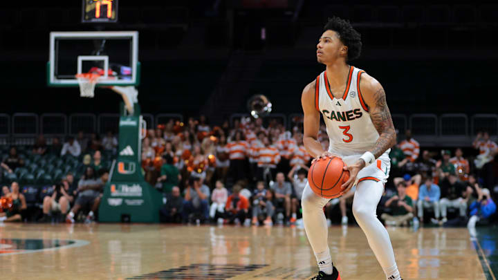 Dec 7, 2024; Coral Gables, Florida, USA; Miami Hurricanes guard Jalil Bethea (3) shoots the basketball against the Clemson Tigers during the second half at Watsco Center. Mandatory Credit: Sam Navarro-Imagn Images