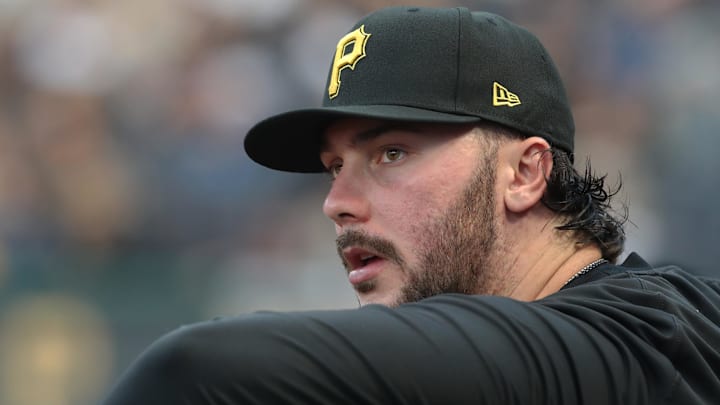 Sep 2, 2025; Pittsburgh, Pennsylvania, USA;  Pittsburgh Pirates  pitcher Paul Skenes (30) looks from the dugout against the Los Angeles Dodgers during the third inning at PNC Park. Mandatory Credit: Charles LeClaire-Imagn Images
