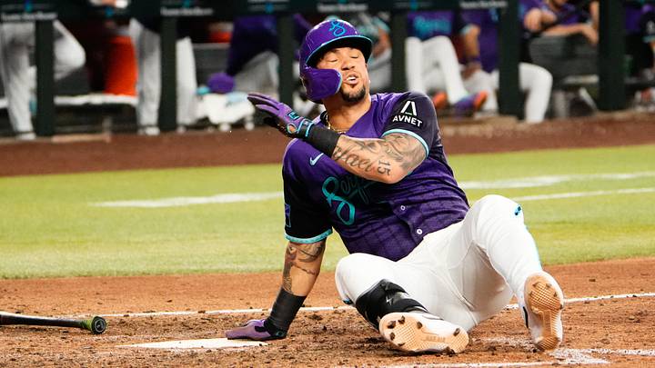 Jun 5, 2026; Phoenix, Arizona, USA; Arizona Diamondbacks first baseman Ildemaro Vargas (6) hits the ground after getting hit with a pitch during the eighth inning at Chase Field against the Washington Nationals. Mandatory Credit: Arianna Grainey-Imagn Images Jun 5, 2026; Phoenix, Arizona, USA; Arizona Diamondbacks first baseman Ildemaro Vargas (6) hits the ground after getting hit with a pitch during the eighth inning at Chase Field against the Washington Nationals. Mandatory Credit: Arianna Grainey-Imagn Images