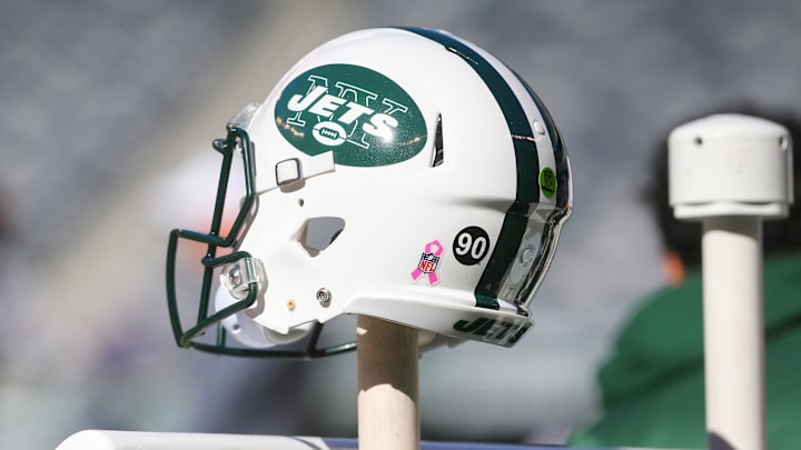 Oct 23, 2016; East Rutherford, NJ, USA; A New York Jets helmet on the bench displays a sticker with the number 90 in memory of former New York Jet Dennis Byrd who was killed in a car accident last week. The Jets face the Baltimore Ravens today at MetLife Stadium. The Jets are wearing  Mandatory Credit: Ed Mulholland-Imagn Images