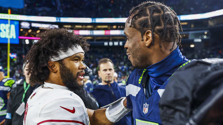 Nov 24, 2024; Seattle, Washington, USA; Arizona Cardinals quarterback Kyler Murray (1) shakes hands with Seattle Seahawks quarterback Geno Smith (7) following a Seahawks at Lumen Field. Mandatory Credit: Joe Nicholson-Imagn Images