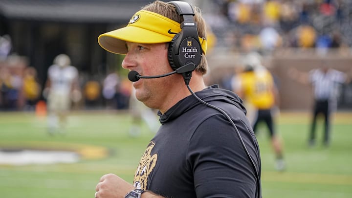 Oct 22, 2022; Columbia, Missouri, USA; Missouri Tigers head coach Eli Drinkwitz on the sidelines against the Vanderbilt Commodores during the first half of the game at Faurot Field at Memorial Stadium. Mandatory Credit: Denny Medley-Imagn Images Oct 22, 2022; Columbia, Missouri, USA; Missouri Tigers head coach Eli Drinkwitz on the sidelines against the Vanderbilt Commodores during the first half of the game at Faurot Field at Memorial Stadium. Mandatory Credit: Denny Medley-Imagn Images