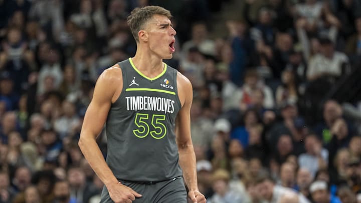 Feb 23, 2025; Minneapolis, Minnesota, USA; Minnesota Timberwolves center Luka Garza (55) reacts after making a three point shot against the Oklahoma City Thunder in the second half at Target Center. Mandatory Credit: Jesse Johnson-Imagn Images Feb 23, 2025; Minneapolis, Minnesota, USA; Minnesota Timberwolves center Luka Garza (55) reacts after making a three point shot against the Oklahoma City Thunder in the second half at Target Center. Mandatory Credit: Jesse Johnson-Imagn Images