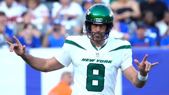 Aug 26, 2023; East Rutherford, New Jersey, USA; New York Jets quarterback Aaron Rodgers (8) greets