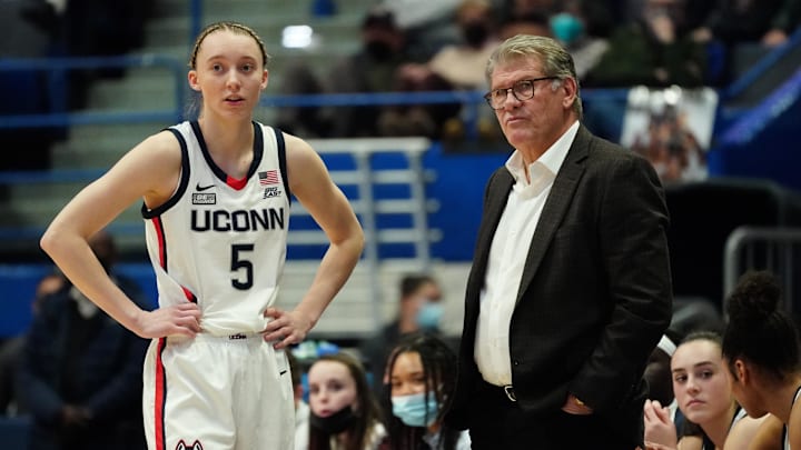 Feb 25, 2022; Hartford, Connecticut, USA; UConn Huskies head coach Geno Auriemma talks with guard Paige Bueckers (5) from the sideline as they take on the St. John's Red Storm in the second half at XL Center. Mandatory Credit: David Butler II-Imagn Images Feb 25, 2022; Hartford, Connecticut, USA; UConn Huskies head coach Geno Auriemma talks with guard Paige Bueckers (5) from the sideline as they take on the St. John's Red Storm in the second half at XL Center. Mandatory Credit: David Butler II-Imagn Images