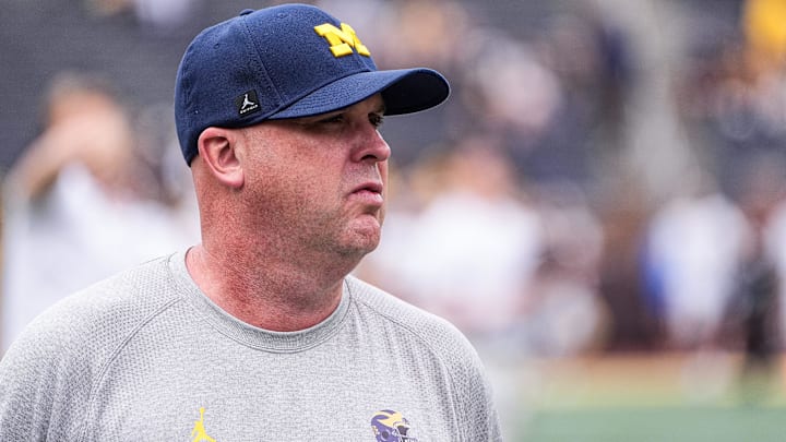 Michigan offensive coordinator Chip Lindsey watches warm up ahead of the Central Michigan game at Michigan Stadium in Ann Arbor on Saturday, Sept. 13, 2025.