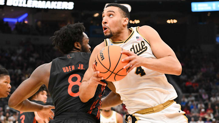 Purdue Boilermakers forward Trey Kaufman-Renn (4) drives to the basket. Purdue Boilermakers forward Trey Kaufman-Renn (4) drives to the basket.