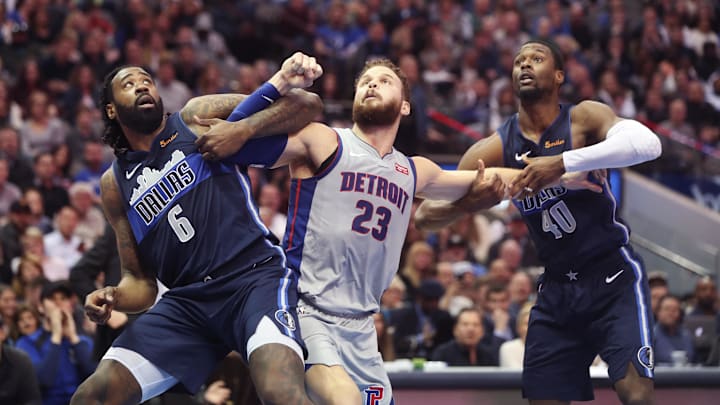 Jan 25, 2019; Dallas, TX, USA; Dallas Mavericks center DeAndre Jordan (6) and forward Harrison Barnes (40) hold back Detroit Pistons forward Blake Griffin (23) during the second half at American Airlines Center. Mandatory Credit: Kevin Jairaj-Imagn Images