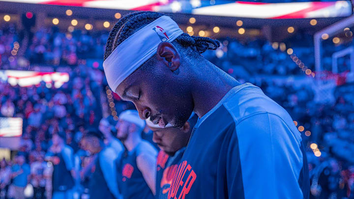 Mar 31, 2025; Oklahoma City, Oklahoma, USA; Oklahoma City Thunder guard Shai Gilgeous-Alexander (2) during the National Anthem before a game against the Chicago Bulls at Paycom Center. Mandatory Credit: Alonzo Adams-Imagn Images Mar 31, 2025; Oklahoma City, Oklahoma, USA; Oklahoma City Thunder guard Shai Gilgeous-Alexander (2) during the National Anthem before a game against the Chicago Bulls at Paycom Center. Mandatory Credit: Alonzo Adams-Imagn Images
