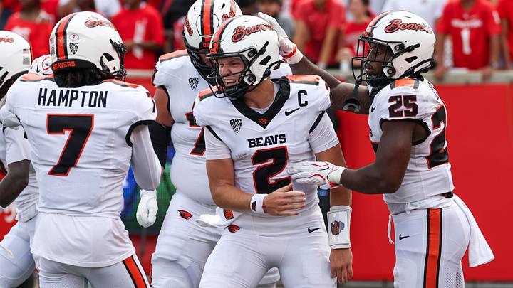Sep 5, 2026; Houston, Texas, USA; Oregon State Beavers quarterback Braden Atkinson (2) celebrates with teammates after scoring a touchdown during the first quarter against the Houston Cougars at TDECU Stadium. Mandatory Credit: Troy Taormina-Imagn Images