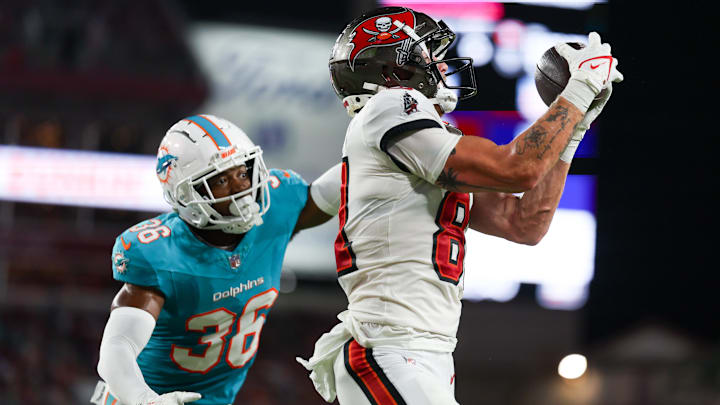 Tampa Bay Buccaneers wide receiver Ryan Miller (81) receives a pass for a touchdown defended by Miami Dolphins cornerback Storm Duck (36) in the second quarter during preseason at Raymond James Stadium. Tampa Bay Buccaneers wide receiver Ryan Miller (81) receives a pass for a touchdown defended by Miami Dolphins cornerback Storm Duck (36) in the second quarter during preseason at Raymond James Stadium.