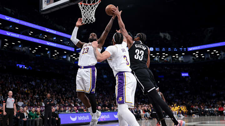 Mar 31, 2024; Brooklyn, New York, USA; Los Angeles Lakers forward LeBron James (23) and center Anthony Davis (30).