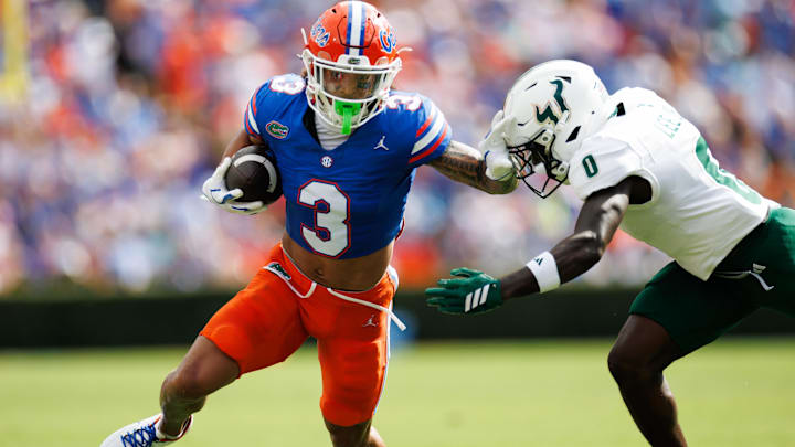 Sep 6, 2025; Gainesville, Florida, USA; Florida Gators wide receiver Eugene Wilson III (3) runs against South Florida Bulls cornerback Jarvis Lee (0) during the first half at Ben Hill Griffin Stadium. Mandatory Credit: Matt Pendleton-Imagn Images