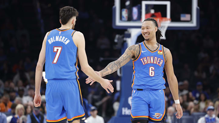 Mar 19, 2025; Oklahoma City, Oklahoma, USA; Oklahoma City Thunder forward Jaylin Williams (6) and Oklahoma City Thunder forward Chet Holmgren (7) high five after a play against the Philadelphia 76ers during the second half at Paycom Center. Mandatory Credit: Alonzo Adams-Imagn Images