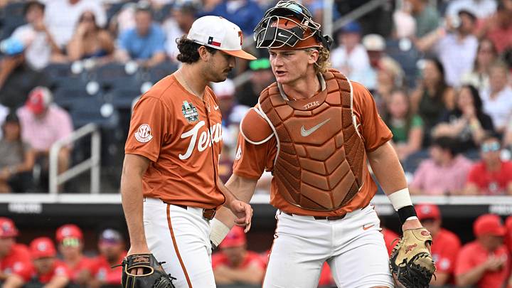 Jun 16, 2026; Omaha, NE, USA; Texas Longhorns starting pitcher Luke Harrison (53) and Texas Longhorns catcher Carson Tinney (8) walk off the field after the first inning against the Georgia Bulldogs at Charles Schwab Field. Mandatory Credit: Steven Branscombe-Imagn Images Jun 16, 2026; Omaha, NE, USA; Texas Longhorns starting pitcher Luke Harrison (53) and Texas Longhorns catcher Carson Tinney (8) walk off the field after the first inning against the Georgia Bulldogs at Charles Schwab Field. Mandatory Credit: Steven Branscombe-Imagn Images