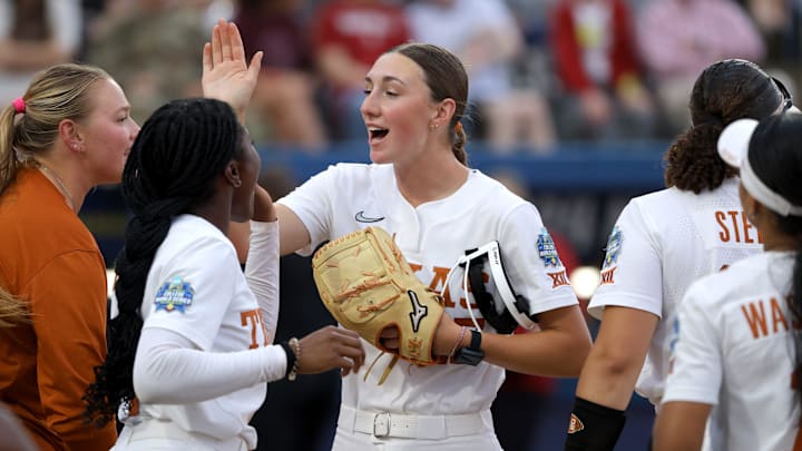 Texas pitcher Teagan Kavan (17) celebrates after an inning during a Women's College World Series semifinal softball game between the Stanford Cardinal and the Texas Longhorns at Devon Park in Oklahoma City, Monday, June 3, 2024. Texas won 1-0.