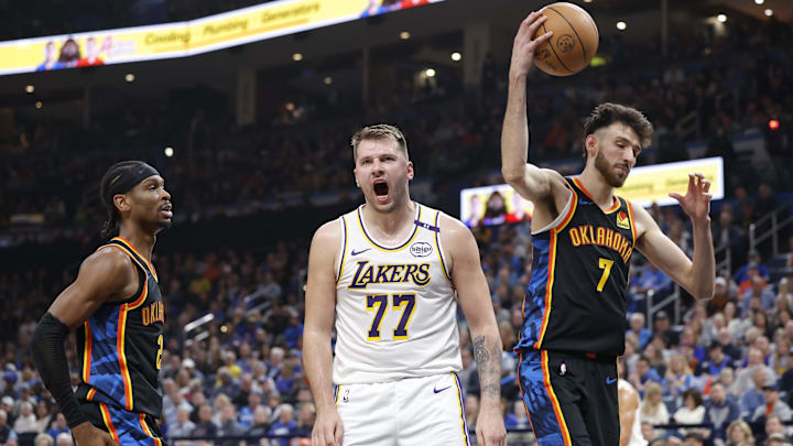 Apr 6, 2025; Oklahoma City, Oklahoma, USA; Los Angeles Lakers guard Luka Doncic (77) yells after scoring against the Oklahoma City Thunder during the second quarter at Paycom Center. Mandatory Credit: Alonzo Adams-Imagn Images