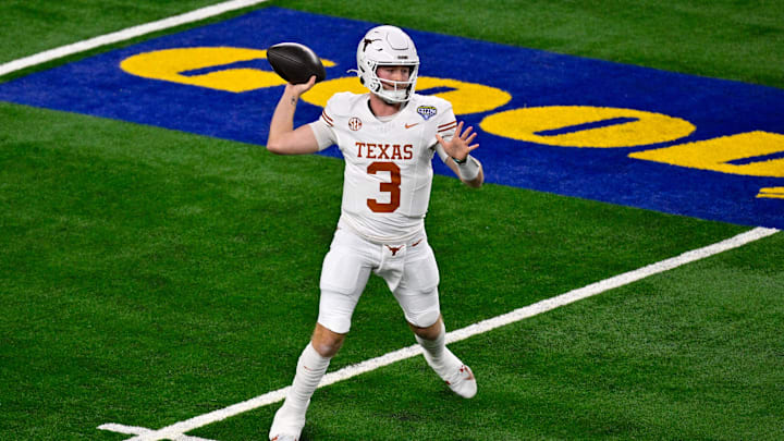 Jan 10, 2025; Arlington, TX, USA; Texas Longhorns quarterback Quinn Ewers (3) in action during the game between the Texas Longhorns and the Ohio State Buckeyes at AT&T Stadium. Mandatory Credit: Jerome Miron-Imagn Images