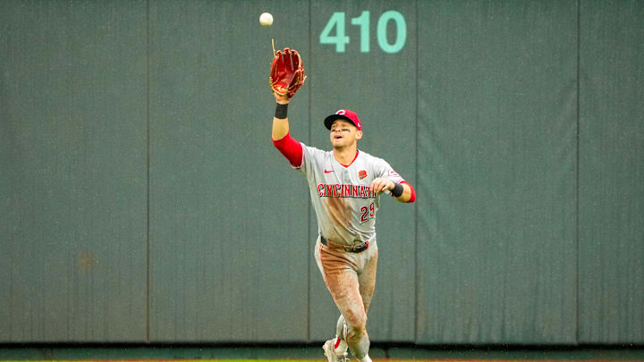 May 26, 2025; Kansas City, Missouri, USA; Cincinnati Reds center fielder TJ Friedl (29) fields a fly ball against the Kansas City Royals in the seventh inning at Kauffman Stadium. Mandatory Credit: Denny Medley-Imagn Images