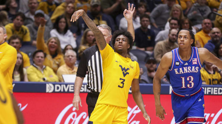 Jan 10, 2026; Morgantown, West Virginia, USA; West Virginia Mountaineers guard Honor Huff (3) shoots a three pointer during the second half against the Kansas Jayhawks at Hope Coliseum. Mandatory Credit: Ben Queen-Imagn Images