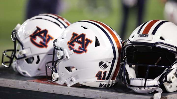 Oct 2, 2021; Baton Rouge, Louisiana, USA; Auburn Tigers helmets sits on a crate during a game against LSU Tigers at Tiger Stadium. Mandatory Credit: Stephen Lew-Imagn Images