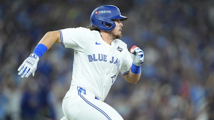 Toronto Blue Jays third baseman Addison Barger (47) runs after hitting a single Toronto Blue Jays third baseman Addison Barger (47) runs after hitting a single