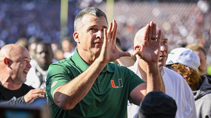 Dec 20, 2025; College Station, TX, USA; Miami Hurricanes head coach Mario Cristobal celebrates as he walks off the field after the Hurricanes win over the Texas A&M Aggies at Kyle Field. Mandatory Credit: Jerome Miron-Imagn Images