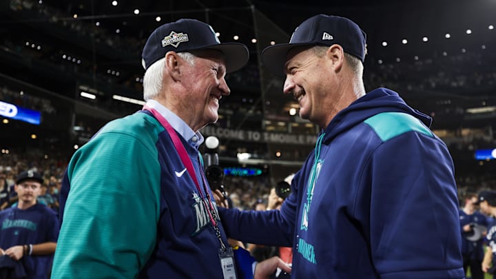 Sep 23, 2025; Seattle, Washington, USA; Seattle Mariners manager Dan Wilson, right, celebrates with majority owner John Stanton following a playoff-clinching victory against the Colorado Rockies at T-Mobile Park. Mandatory Credit: Joe Nicholson-Imagn Images