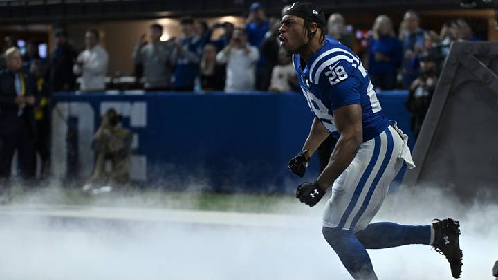 Nov 30, 2025; Indianapolis, Indiana, USA; Indianapolis Colts running back Jonathan Taylor (28) is introduced before a game against the Houston Texans at Lucas Oil Stadium. Mandatory Credit: Robert Goddin-Imagn Images