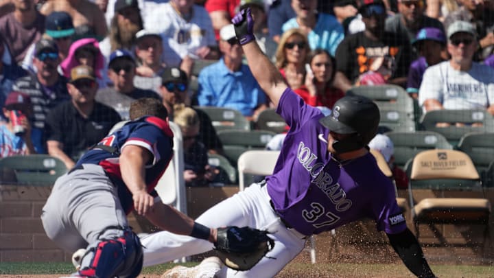 Mar 4, 2026; Scottsdale, AZ, USA; Colorado Rockies catcher Braxton Fulford (37) scores a run on United States catcher Will Smith (16) in the second inning at Salt River Fields. Mandatory Credit: Rick Scuteri-Imagn Images