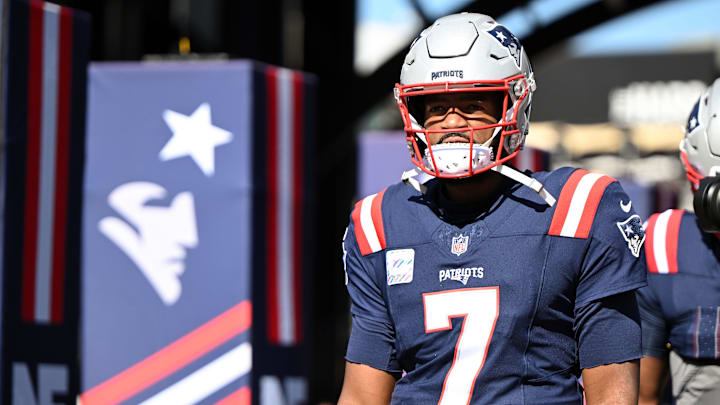 Oct 6, 2024; Foxborough, Massachusetts, USA;  New England Patriots quarterback Jacoby Brissett (7) walks onto the field before a game against the Miami Dolphins at Gillette Stadium.