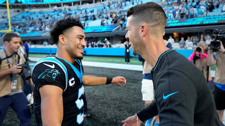 Nov 3, 2024; Charlotte, North Carolina, USA; Carolina Panthers quarterback Bryce Young (9) with head coach Dave Canales after the game at Bank of America Stadium. Mandatory Credit: Bob Donnan-Imagn Images